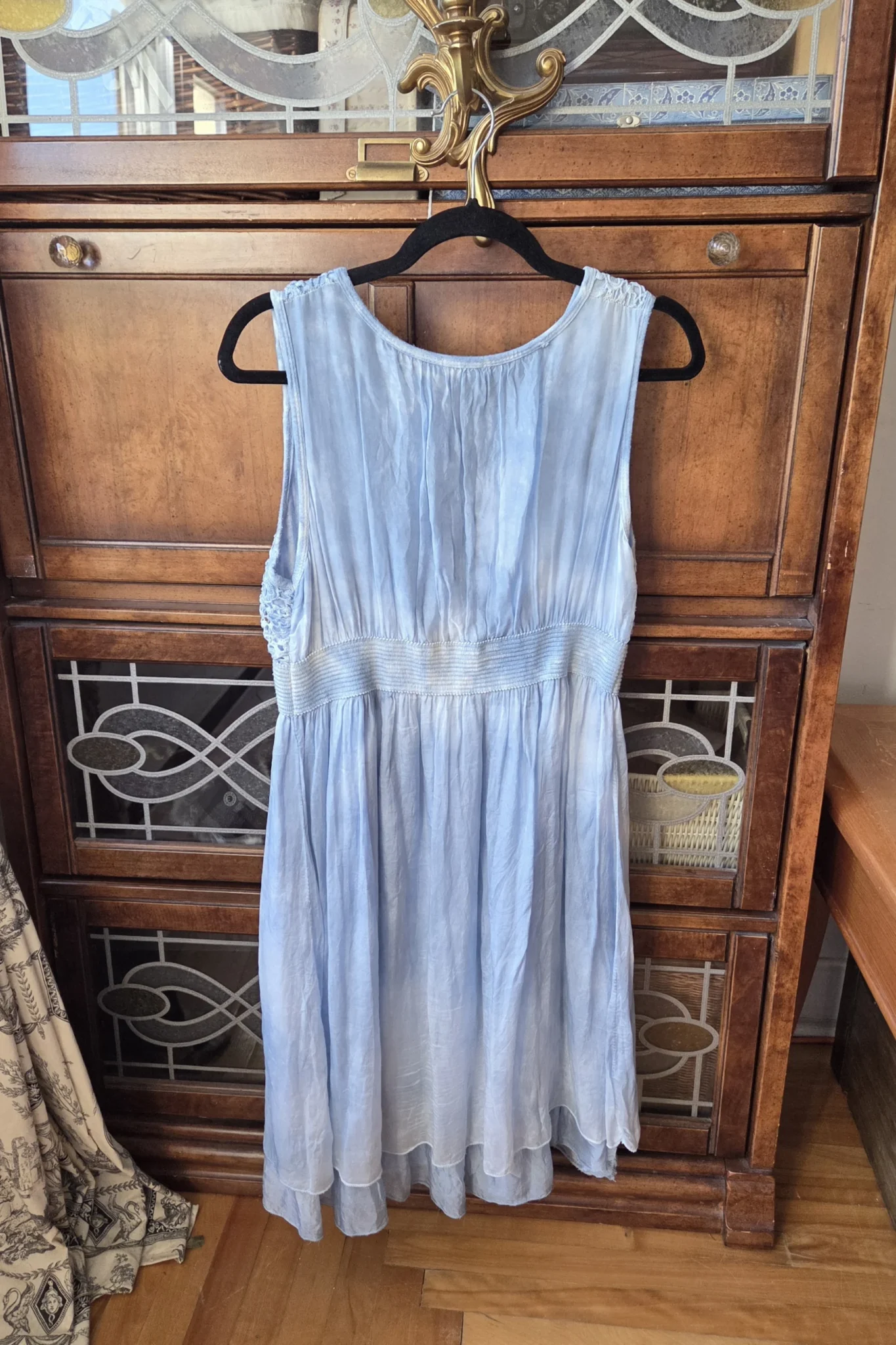 Image for A beautiful light blue sleeveless dress made from a silk blend