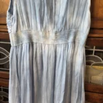 Thumbnail for A beautiful light blue sleeveless dress made from a silk blend