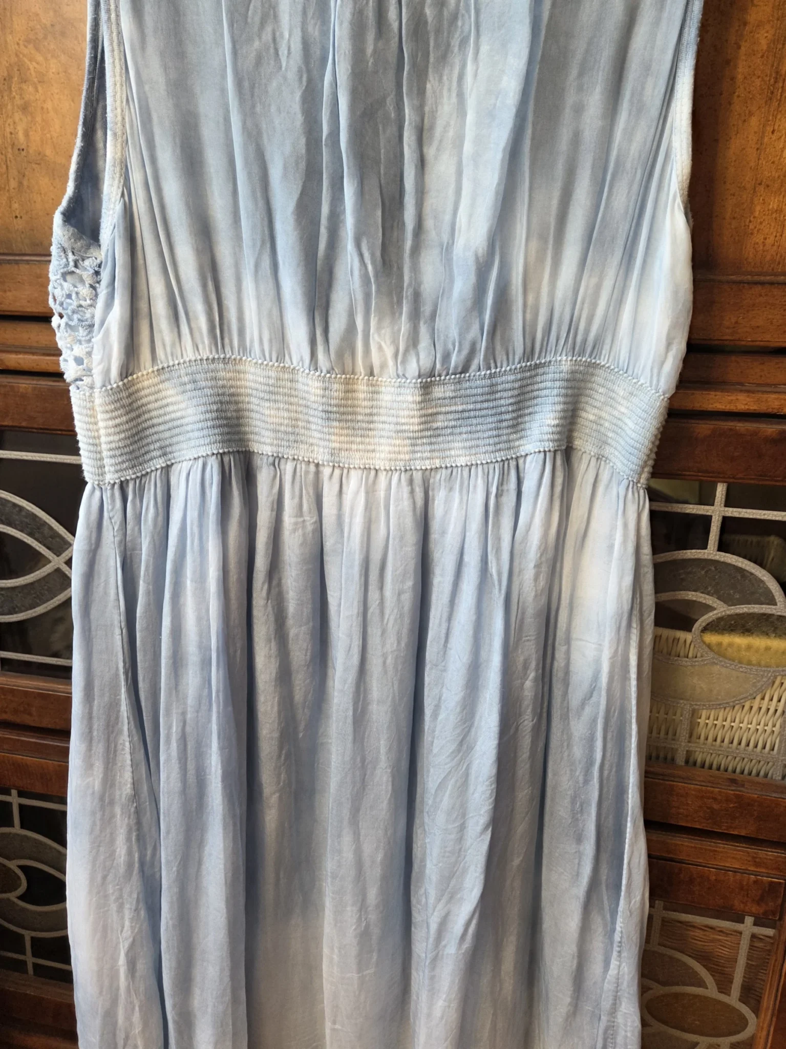 Image for A beautiful light blue sleeveless dress made from a silk blend