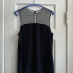 Featured thumbnail for Black sleeveless blouse