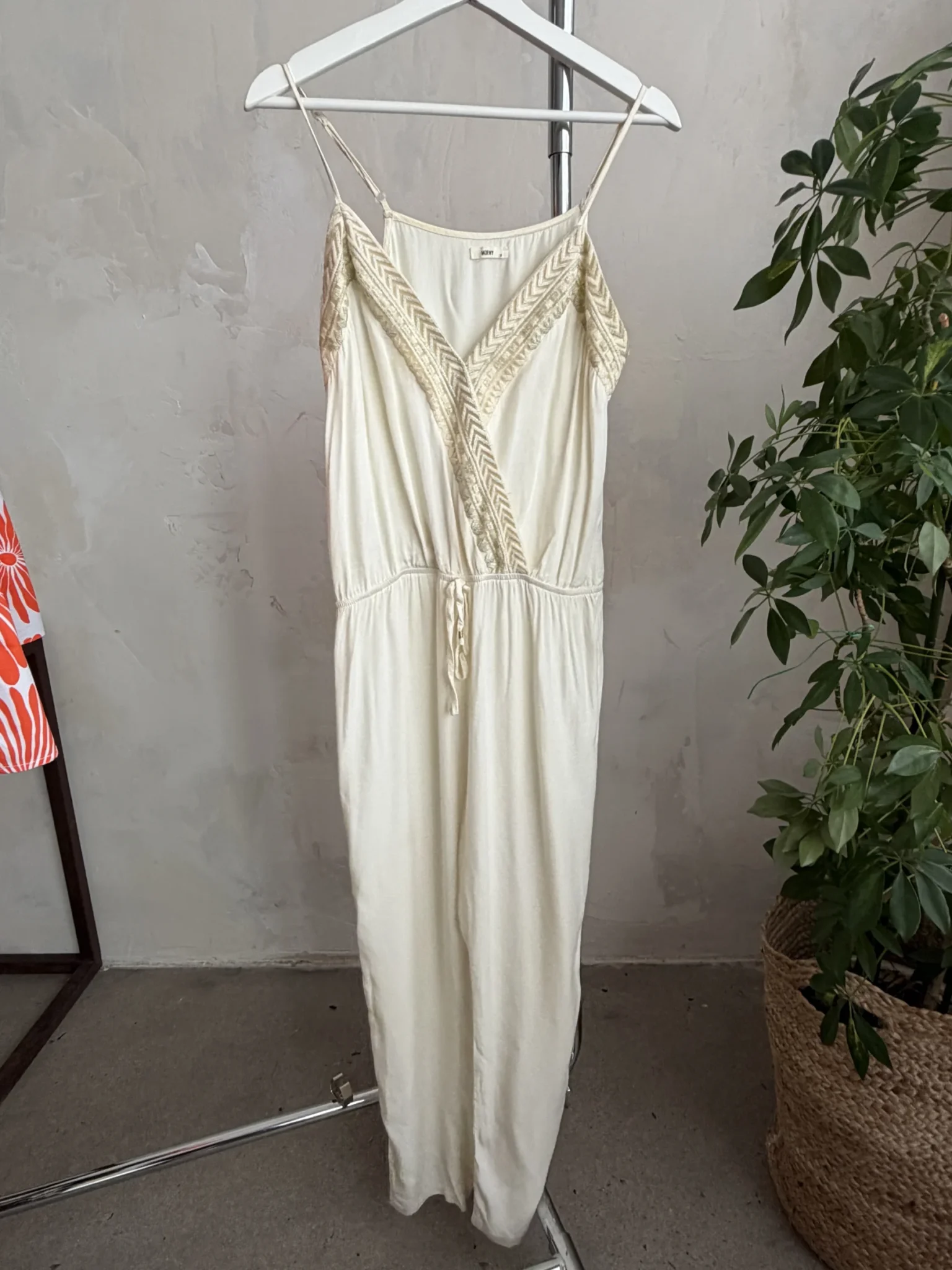 Featured image for A lightweight, flowing fabric jumpsuit with embroidery