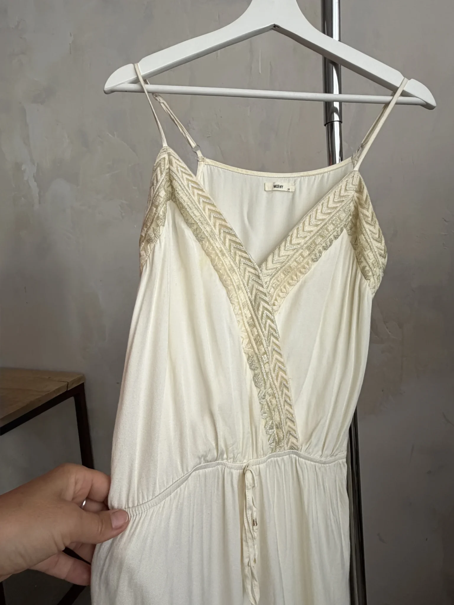 Image for A lightweight, flowing fabric jumpsuit with embroidery