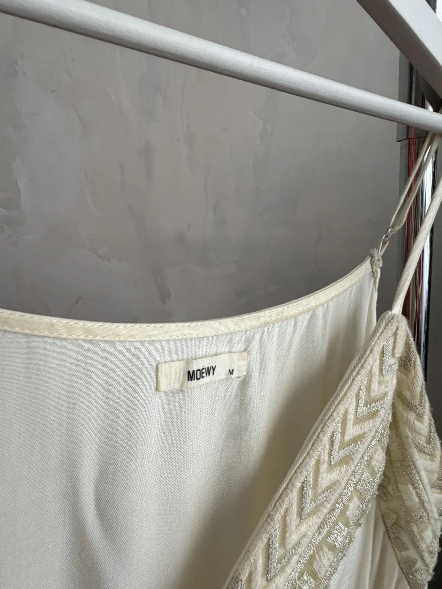 Image for A lightweight, flowing fabric jumpsuit with embroidery