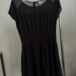 Featured thumbnail for Short little black dress with sheer shoulders