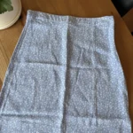 Thumbnail for Blue skirt with white flowers