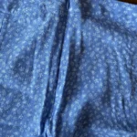 Thumbnail for Blue skirt with white flowers