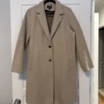 Featured thumbnail for Manteau d’automne beige mi-long