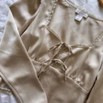 Featured thumbnail for Blouse à boucles house of harlow