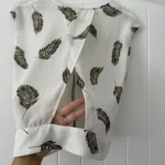 Thumbnail for Blouse sans manches dynamite