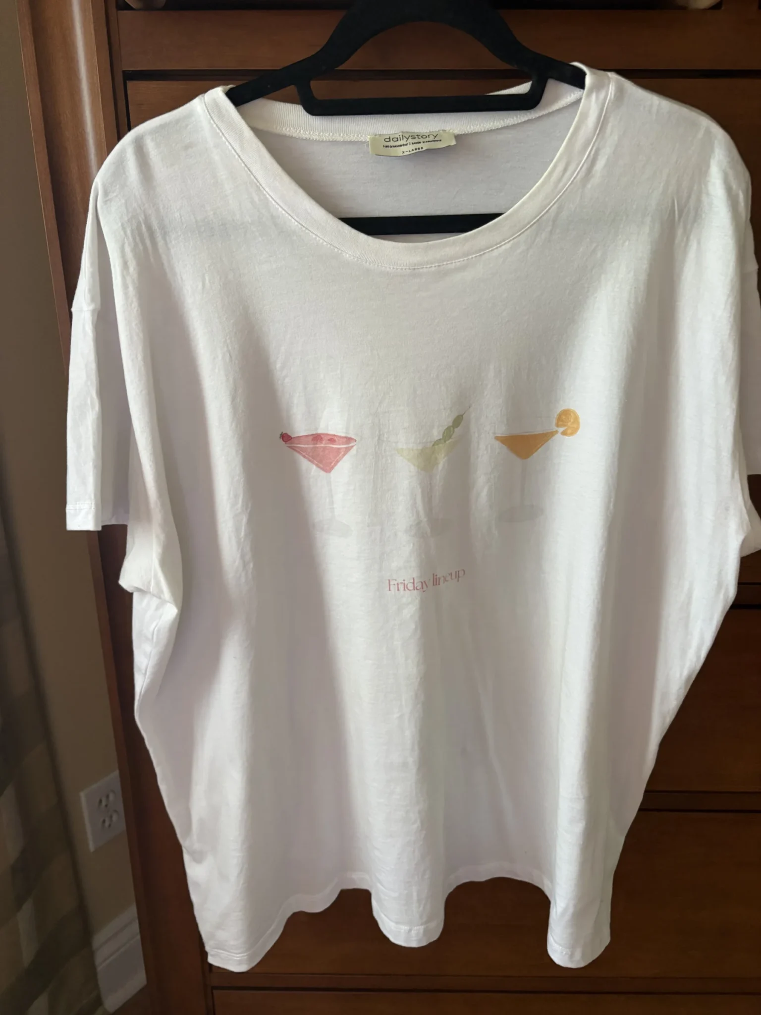 Featured image for White short-sleeved T-shirt with designs