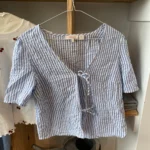 Featured thumbnail for Chemise avec boucles