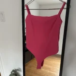 Featured thumbnail for Dynamite bodysuit
