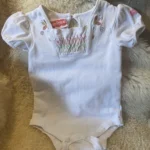 Thumbnail for 12-month-old romper, runs small