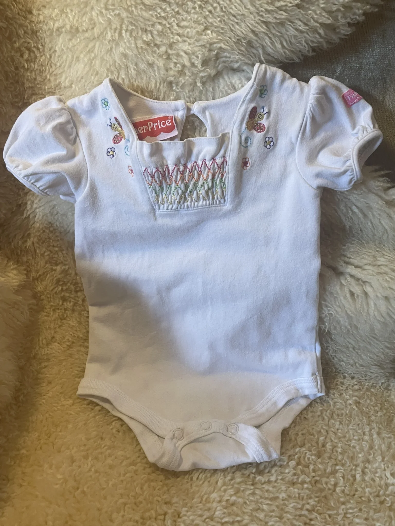 Image for 12-month-old romper, runs small