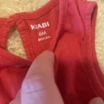 Thumbnail for 6-month-old baby vest, made a size larger