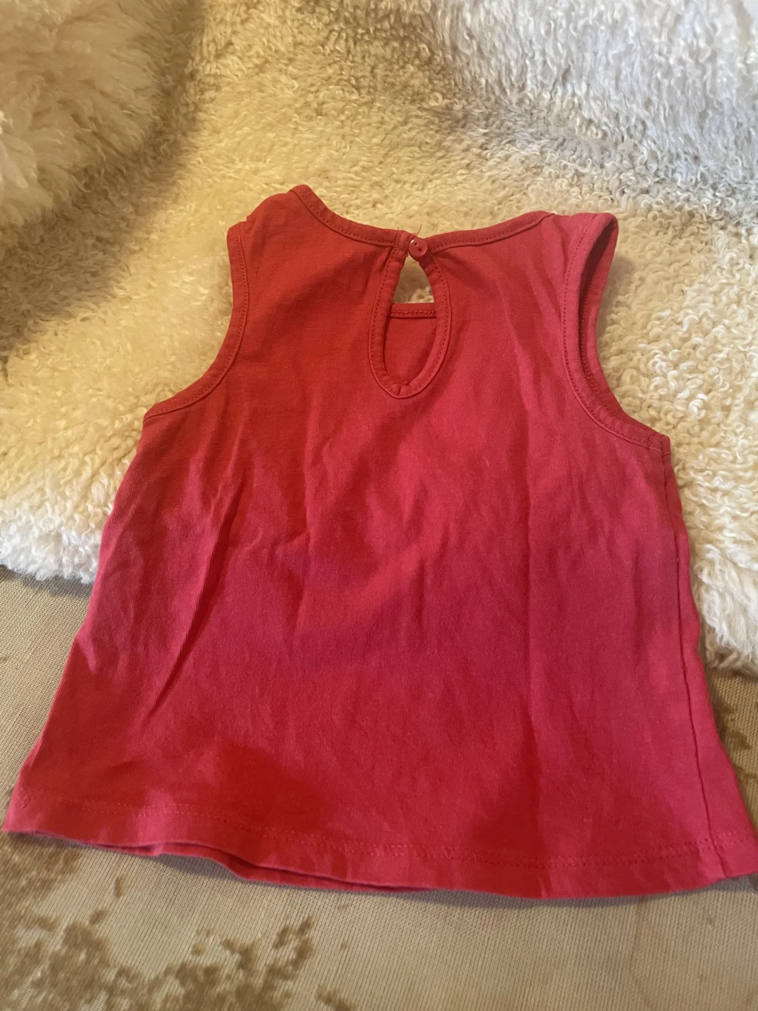 Image for 6-month-old baby vest, made a size larger