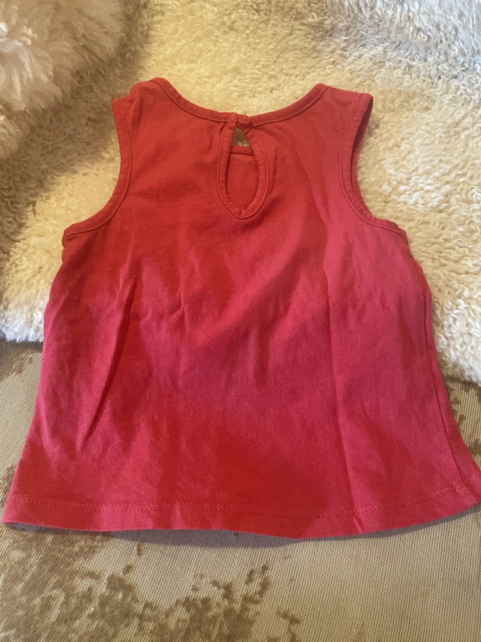 Image for 6-month-old baby vest, made a size larger