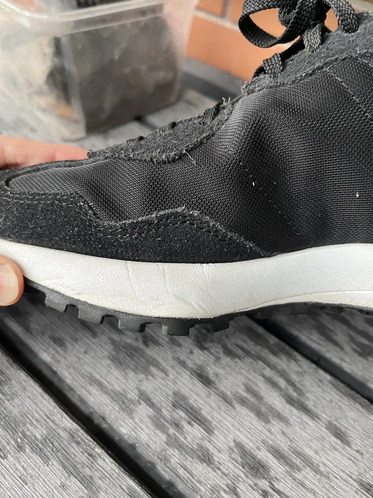 Image for Black New Balance trainers with an animal print
