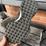 Thumbnail for Black New Balance trainers with an animal print