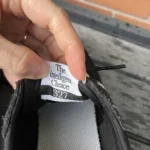 Thumbnail for Black New Balance trainers with an animal print