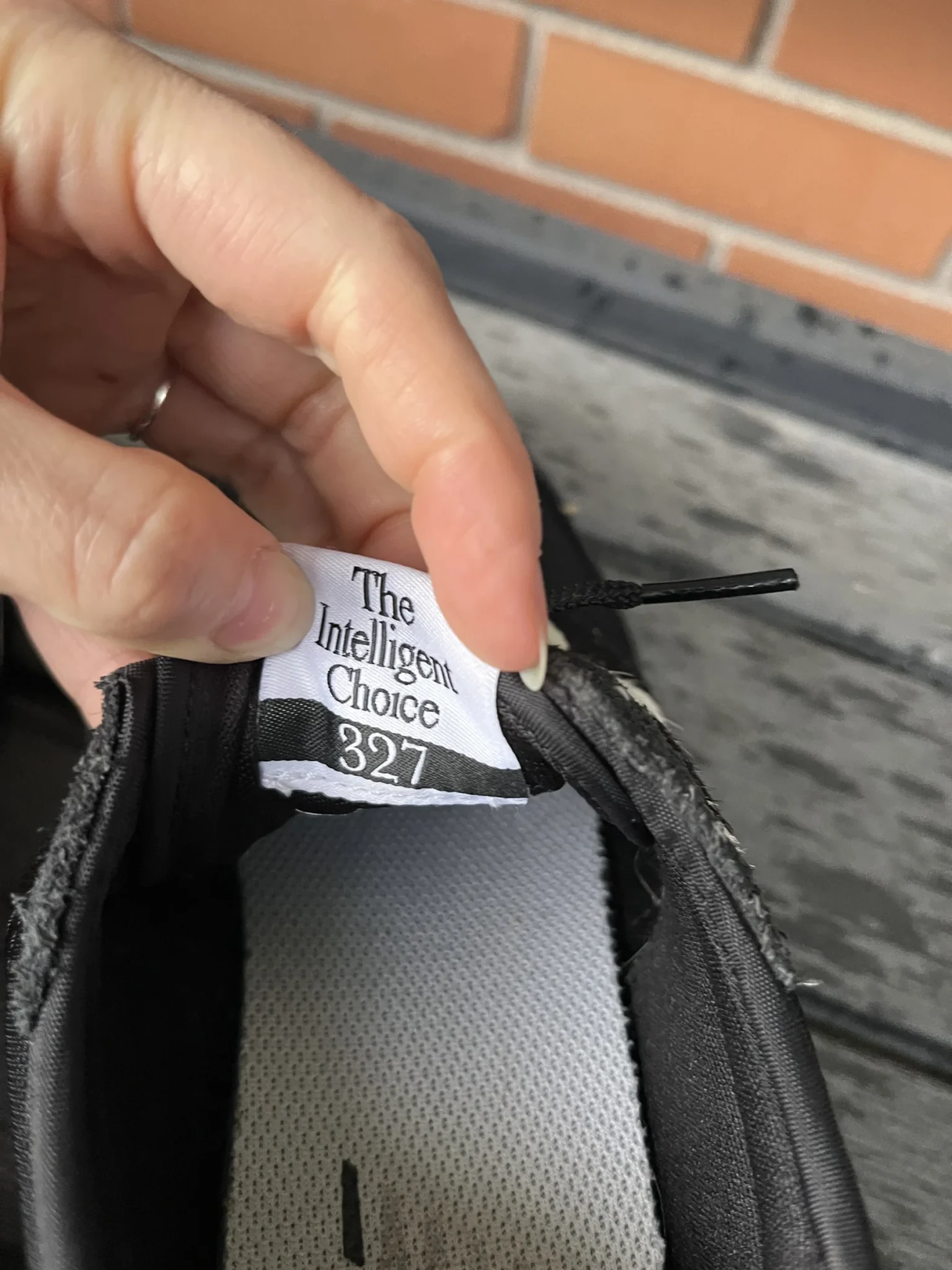 Image for Black New Balance trainers with an animal print