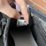 Thumbnail for Black New Balance trainers with an animal print