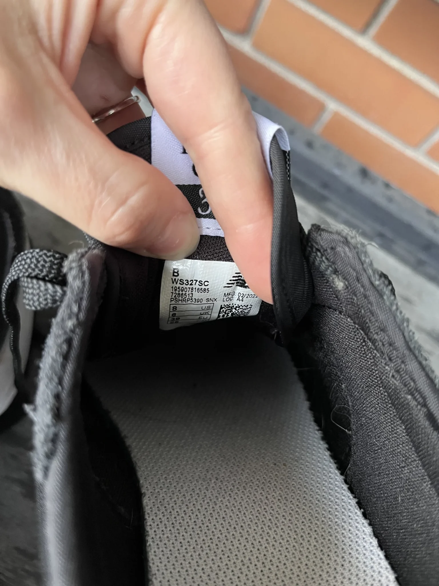 Image for Black New Balance trainers with an animal print