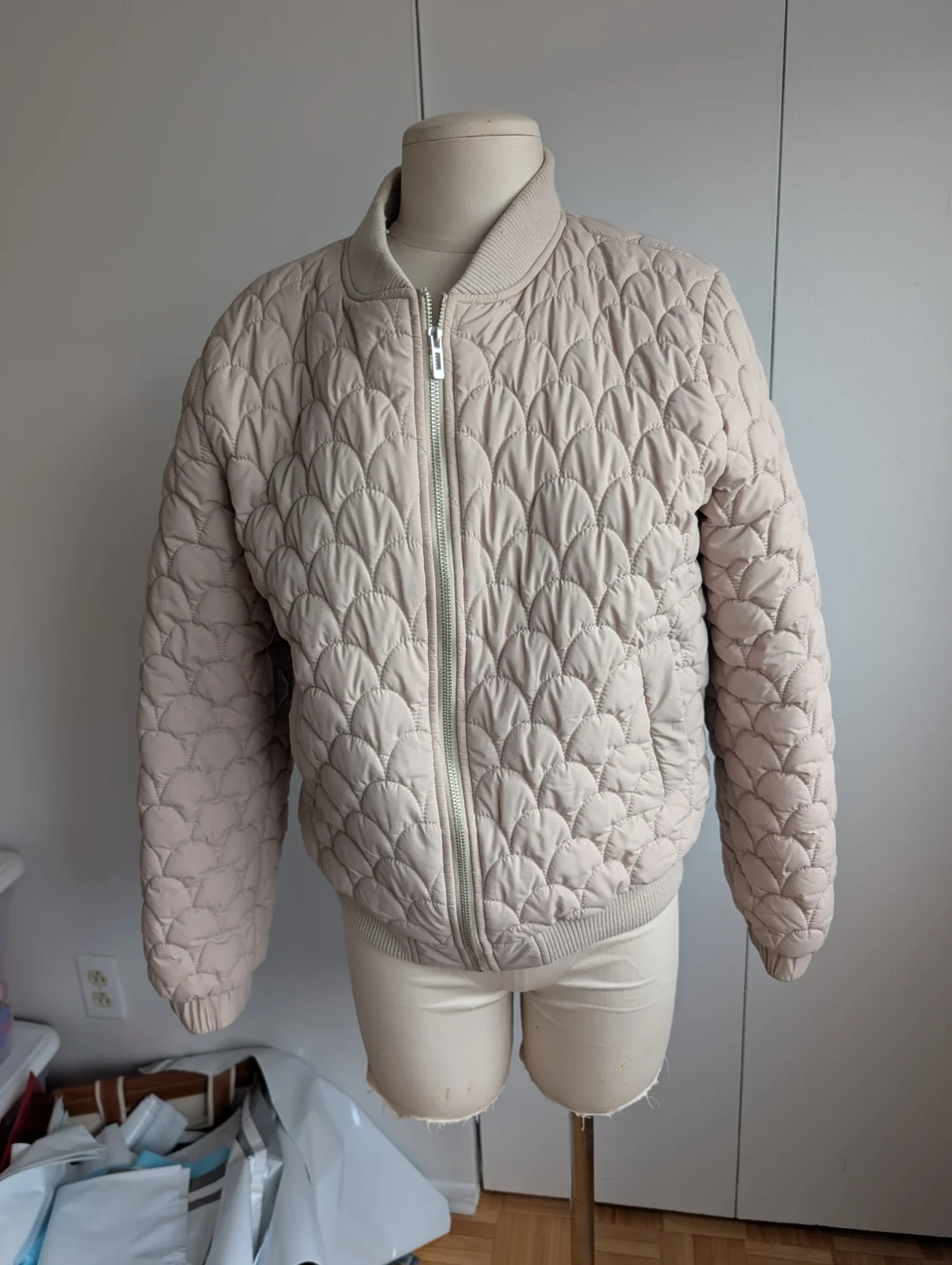 Featured image for Cream-coloured puffer jacket