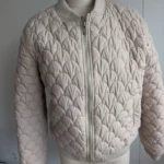 Thumbnail for Cream-coloured puffer jacket