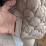 Thumbnail for Cream-coloured puffer jacket