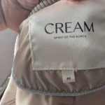 Thumbnail for Cream-coloured puffer jacket