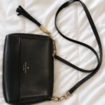 Featured thumbnail for Kate Spade New York – Black Flap Crossbody in black leather