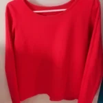 Featured thumbnail for Add some pizzazz to your look with this casual-style orange long-sleeved jumper!