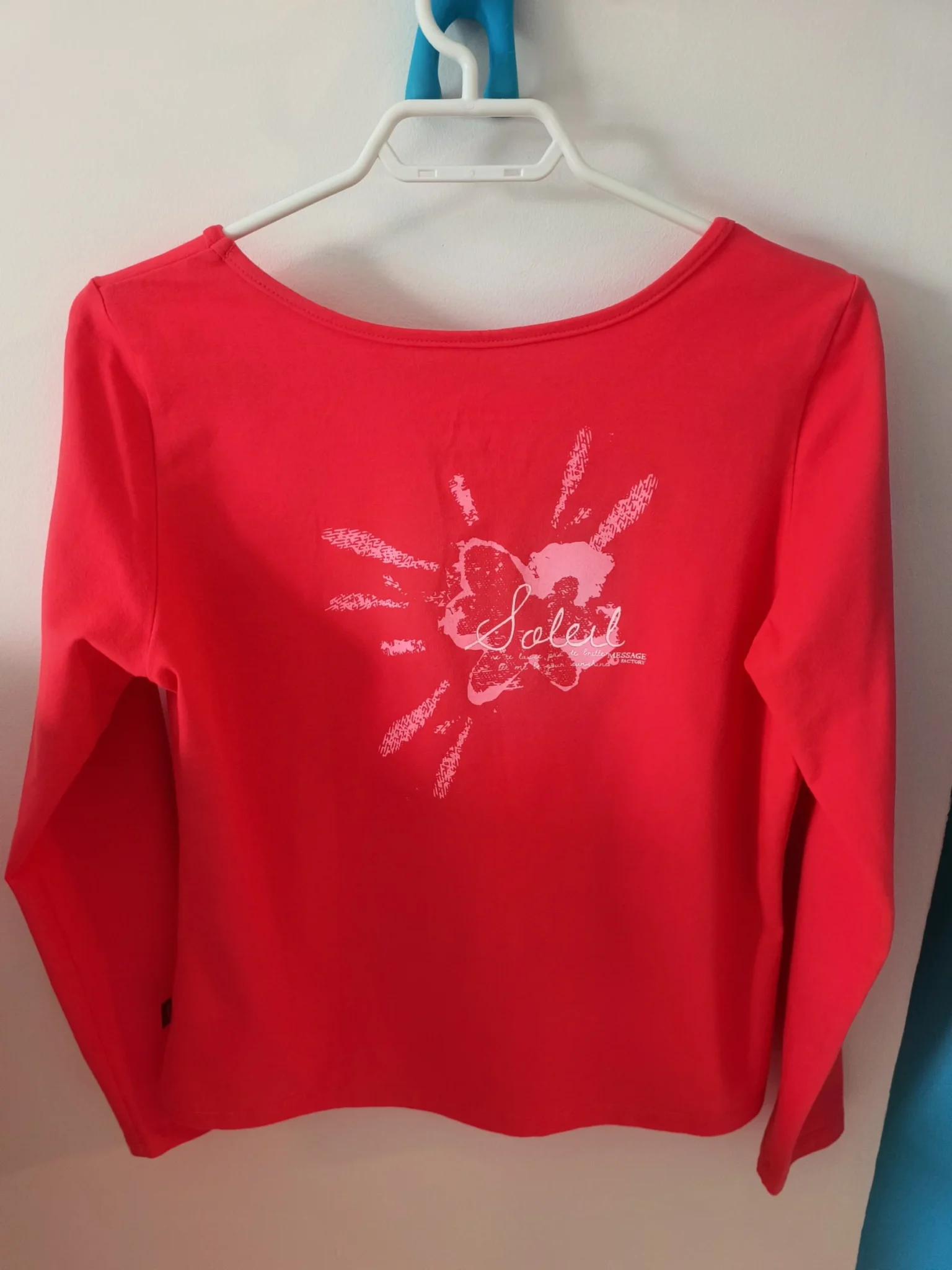 Image for Add some pizzazz to your look with this casual-style orange long-sleeved jumper!