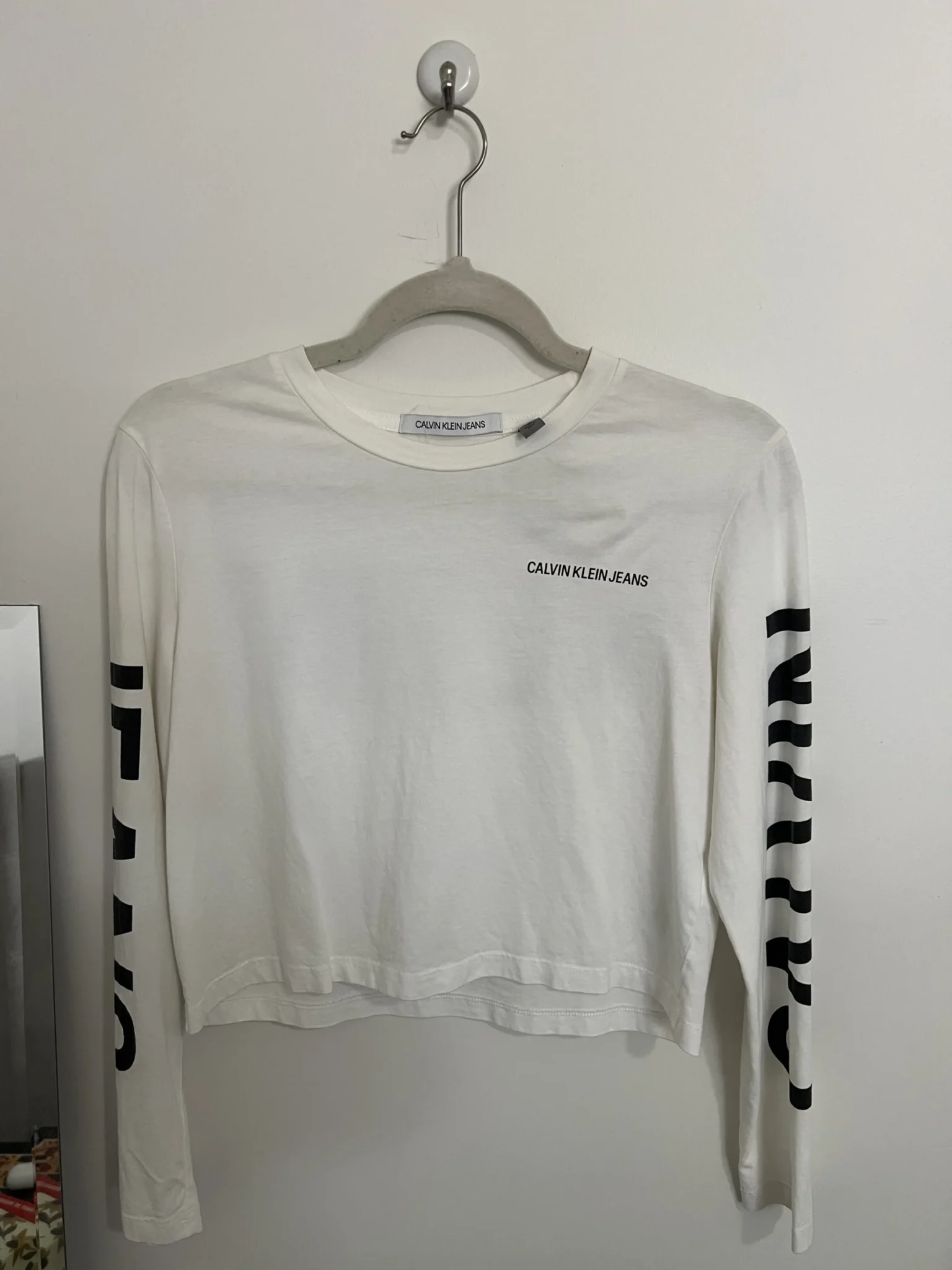 Featured image for Calvin klein white longsleeve