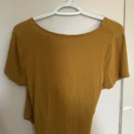 Thumbnail for Yellow wrap-around jumper