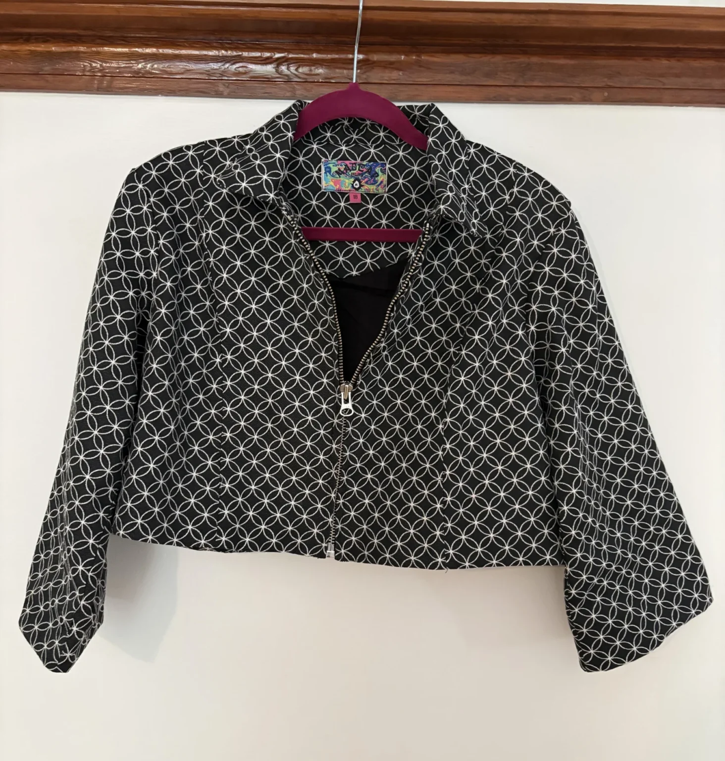 Featured image for Mad Cap England – Black and white cropped jacket with a geometric pattern