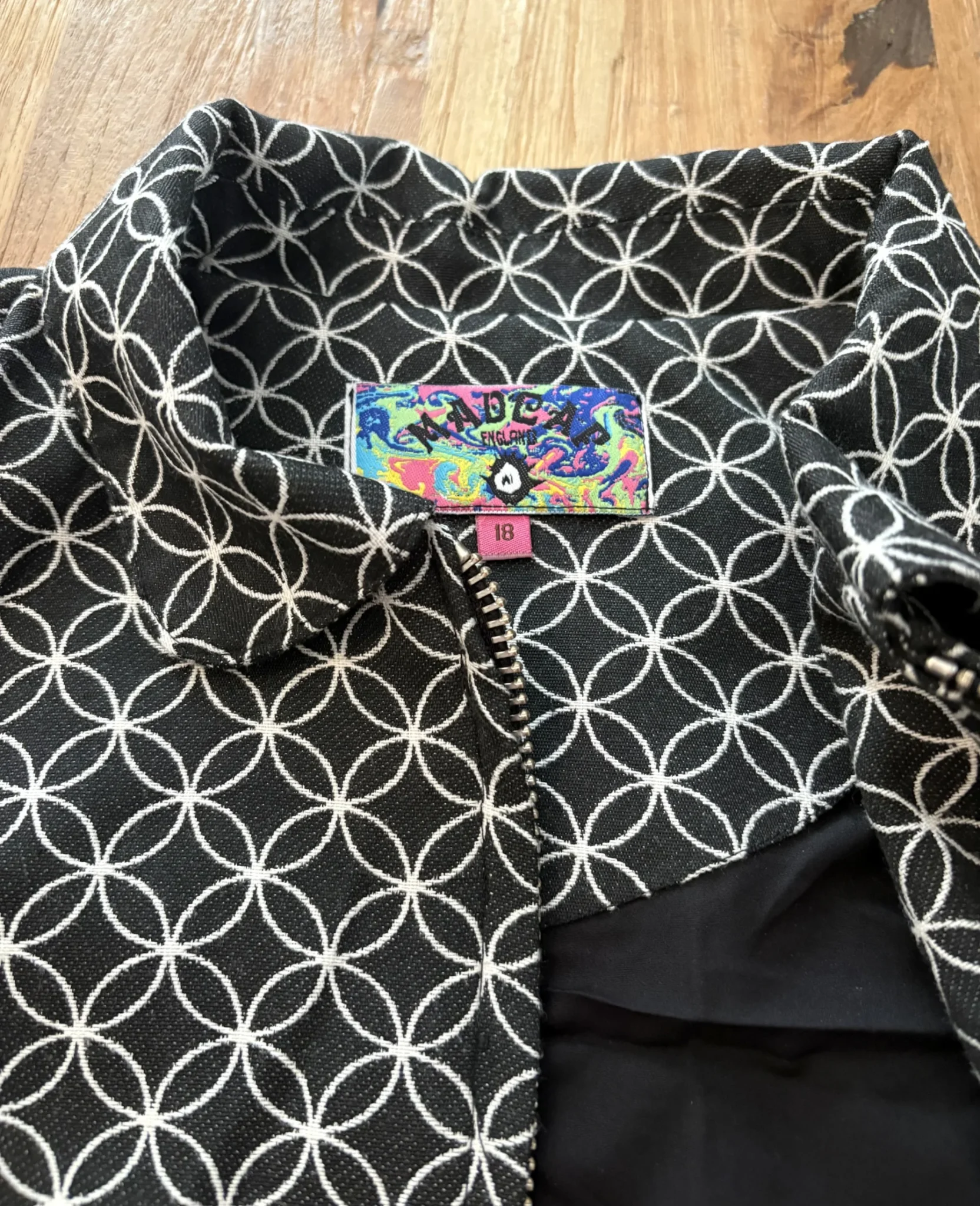 Image for Mad Cap England – Black and white cropped jacket with a geometric pattern