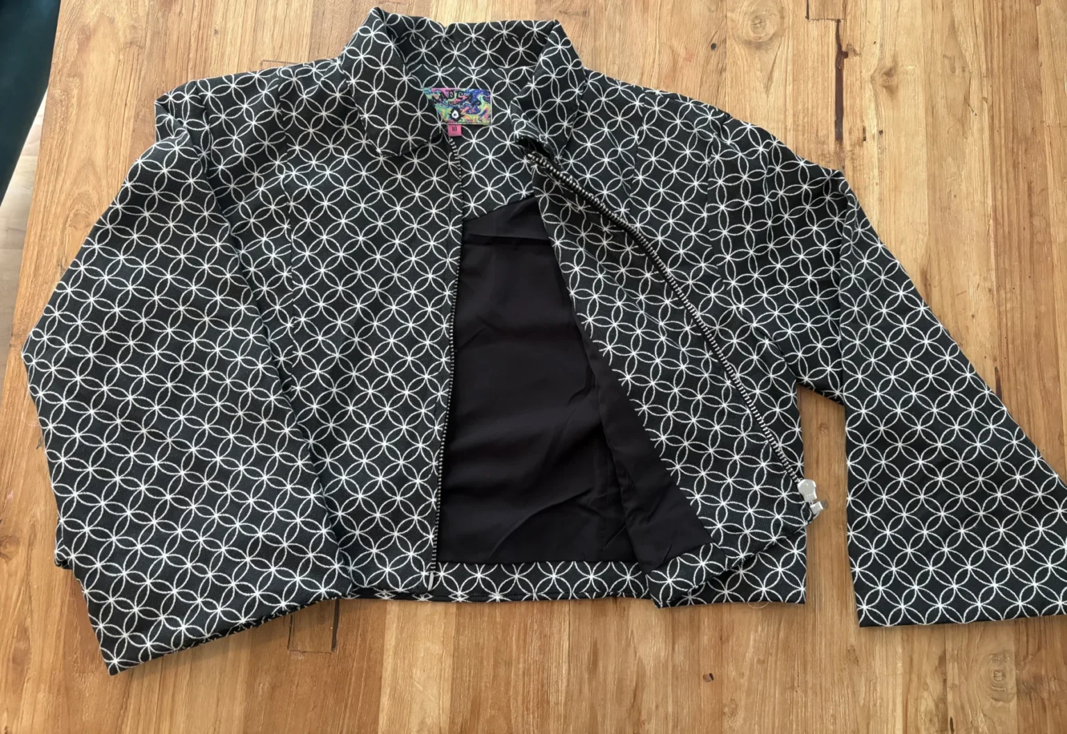 Image for Mad Cap England – Black and white cropped jacket with a geometric pattern