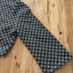 Thumbnail for Mad Cap England – Black and white cropped jacket with a geometric pattern