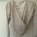 Featured thumbnail for Wrap-around shirt - Womance