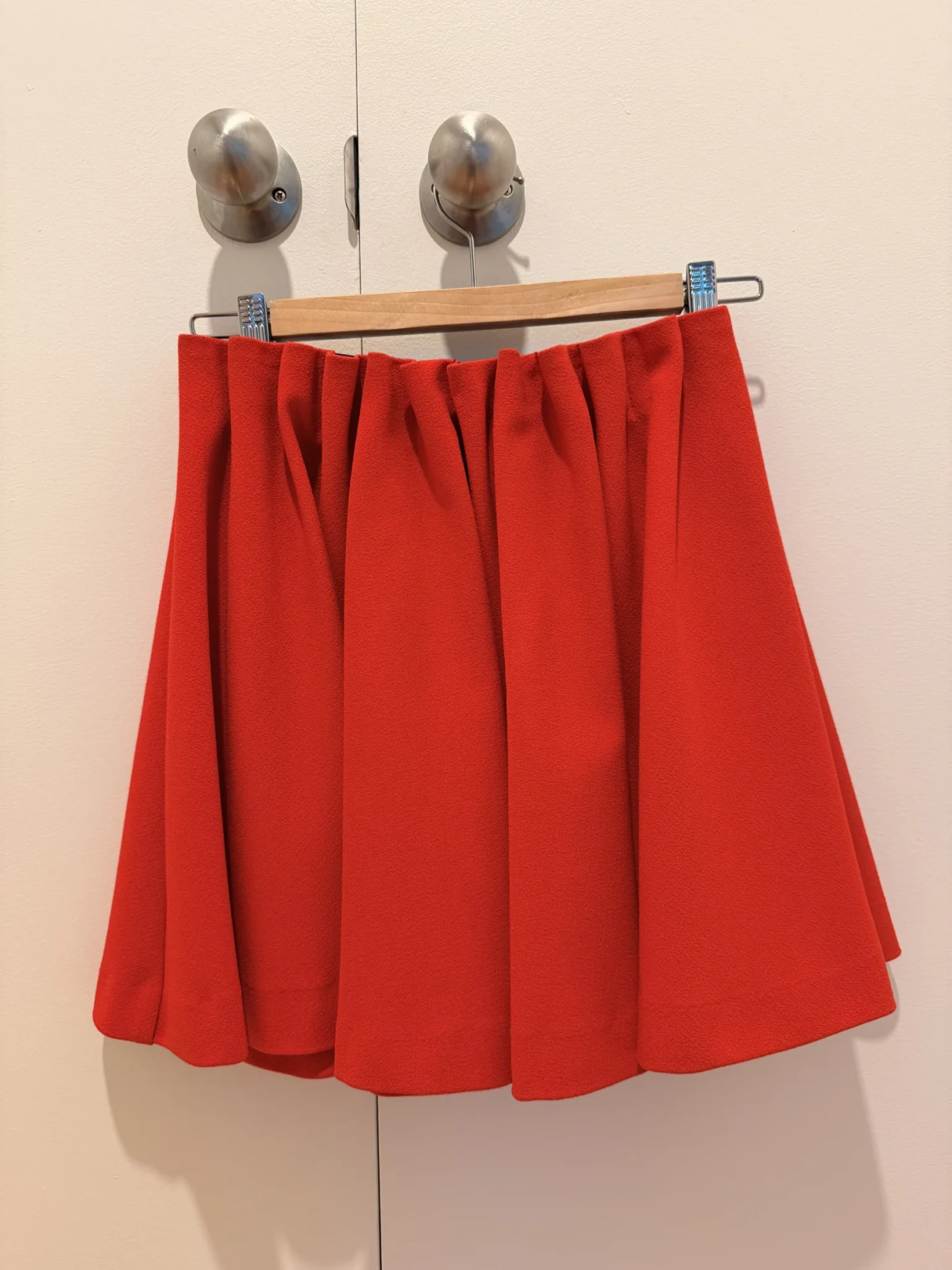 Featured image for H&M coral circle skirt – Size 36