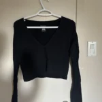 Featured thumbnail for Fitted jumper with a V-neck