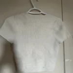 Thumbnail for Crop-length wrap-round jumper