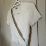 Thumbnail for Crop-length wrap-round jumper