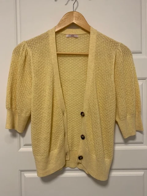 Featured image for Openwork-knit cardigan