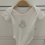 Thumbnail for Perlimpinpin Onesie