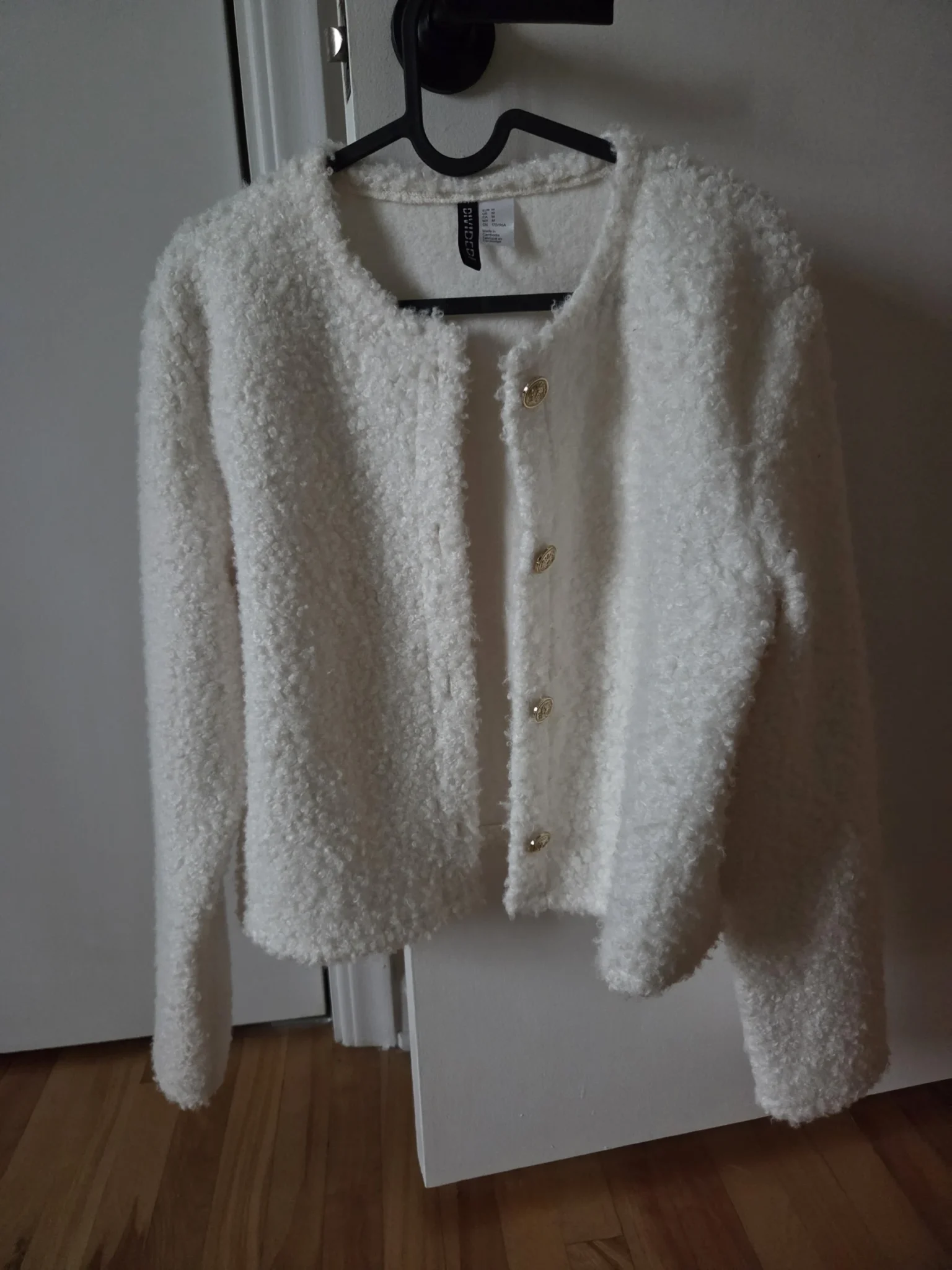 Featured image for Blaser HM white bouclé-effect