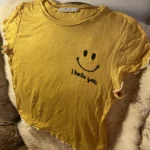 Thumbnail for Yellow T-shirt, size S, with a happy face 😃