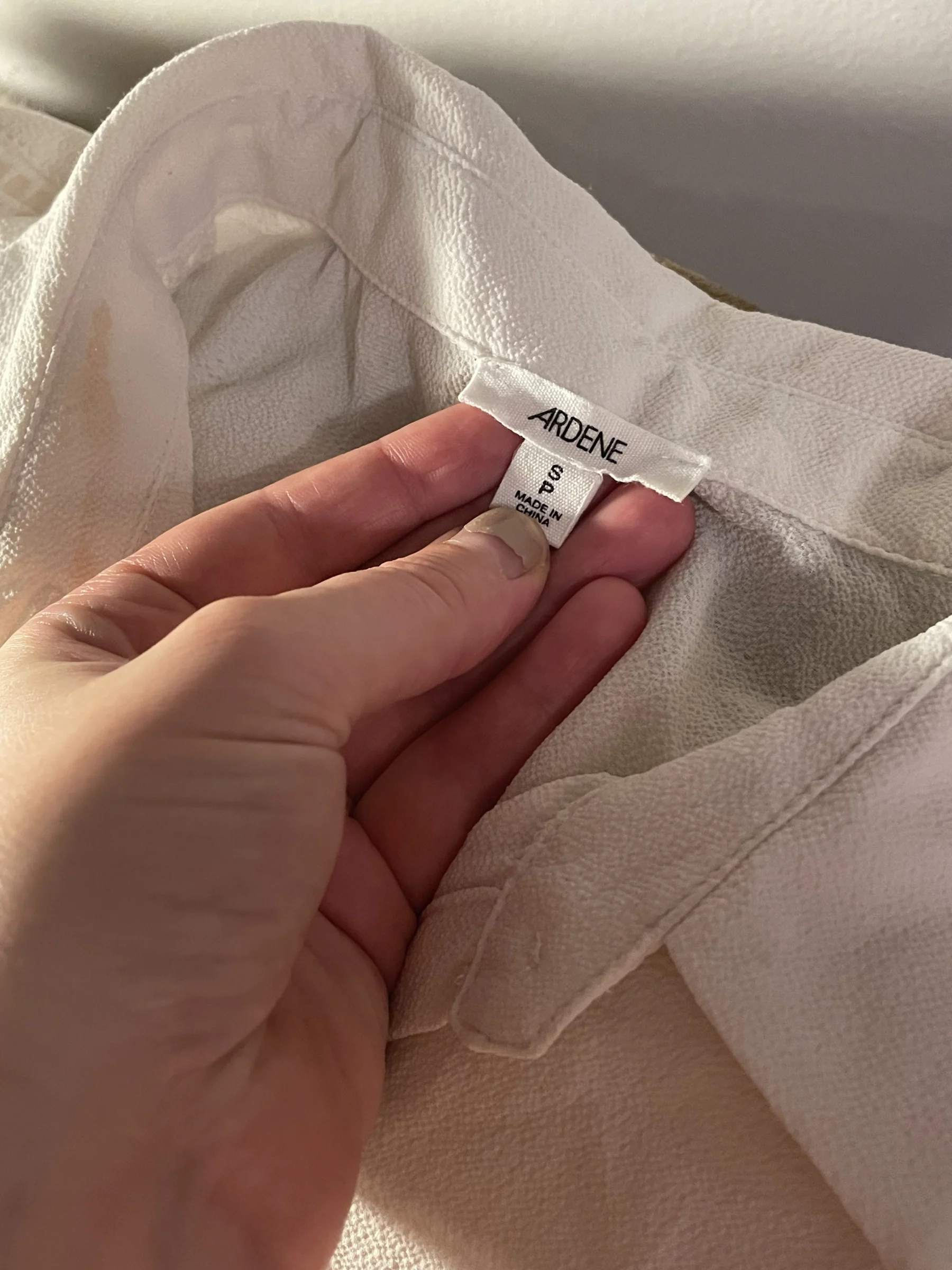 Jolie blouse sans manches vaporeuse. Ardene seconde main